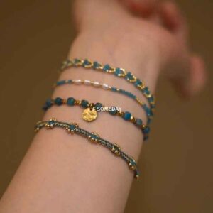 A set of four handmade pearl bracelets, which can be worn separately or stacked. |Belle accessories